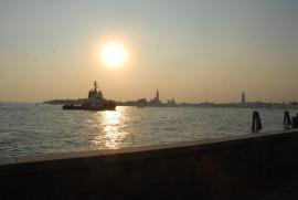 Venice view from the giardini shore with freight ship