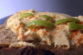 houmus (chick peas) spread on onion bread from own kneading houmus (chick peas) spread on onion bread from own kneading