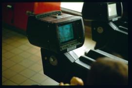 USA 1990/Augusta, GA/Greyhound station waiting room/coin-operated tv set in chair